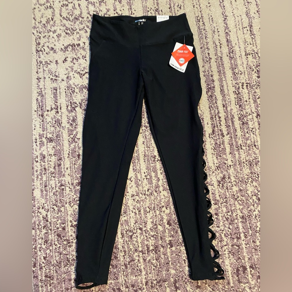 Marika 7/8 legging NWT. Size small detail sides